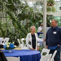 Ben Rapin and Claudia Bajema standing at event, chatting